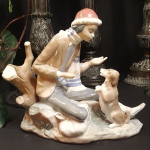 Glossy NAO by Lladro fine porcelain figurine titled "Lesson for the Dog", #140